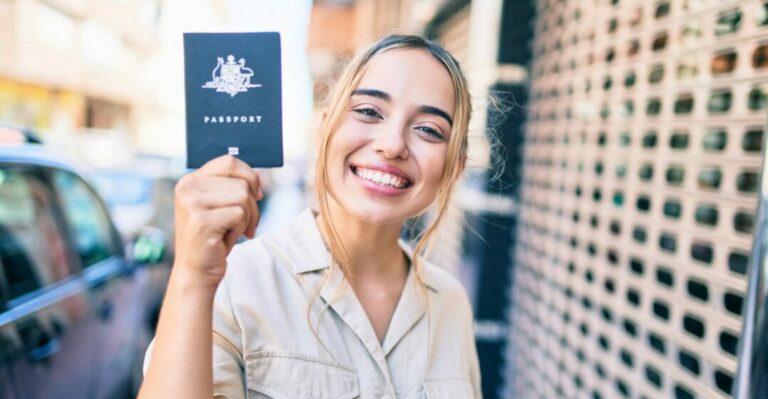 SMiling woman with an Australian passport and permanent residency