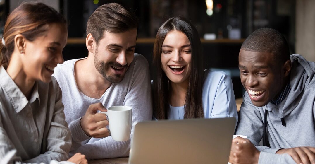 Friends looking at funny french language memes