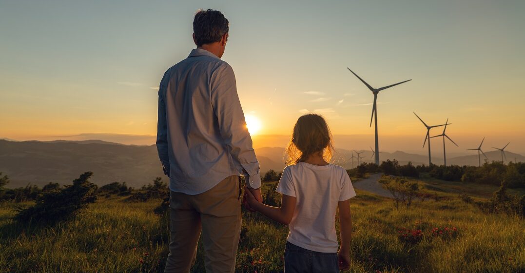 A father teaching his daughter environment vocabulary in French