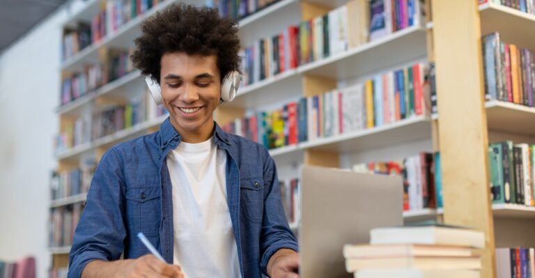 Student in a library taking one of the best online SPanish classes